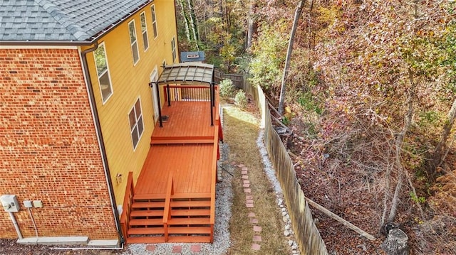 view of yard featuring a wooden deck