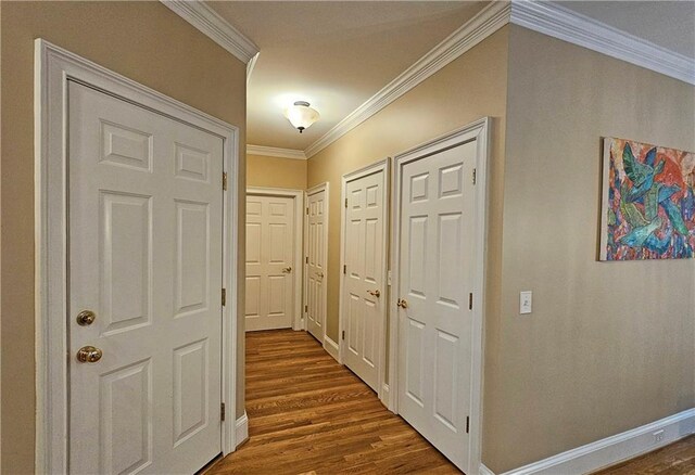215 Settindown Ct, Roswell, GA 30075 - hall featuring dark wood-style flooring and crown molding