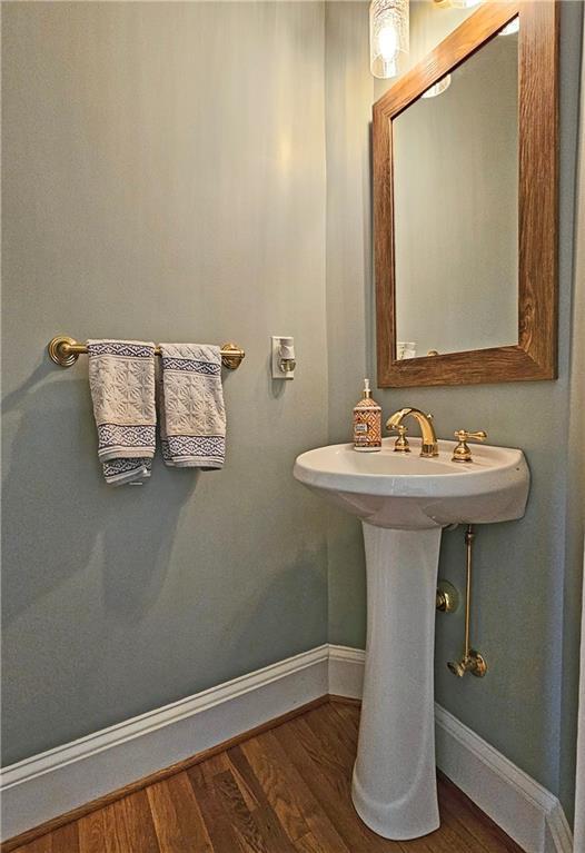 215 Settindown Ct, Roswell, GA 30075 - bathroom featuring wood finished floors