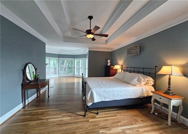 215 Settindown Ct, Roswell, GA 30075 - bedroom with a raised ceiling, crown molding, wood finished floors, and ceiling fan