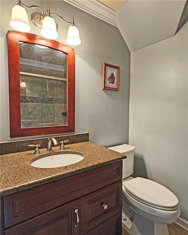 215 Settindown Ct, Roswell, GA 30075 - full bath featuring vanity and tiled shower