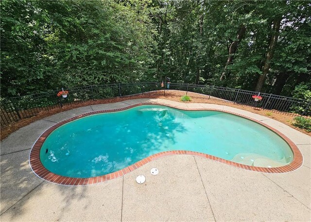 215 Settindown Ct, Roswell, GA 30075 - view of pool featuring a fenced backyard and a patio area