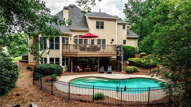 215 Settindown Ct, Roswell, GA 30075 - back of house with a deck, a shingled roof, a patio area, and stairway