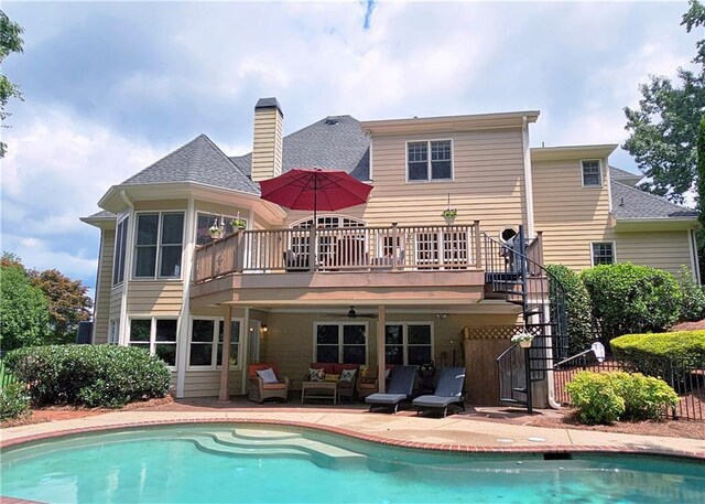 215 Settindown Ct, Roswell, GA 30075 - back of house with outdoor lounge area, a deck, a shingled roof, a patio area, and stairway