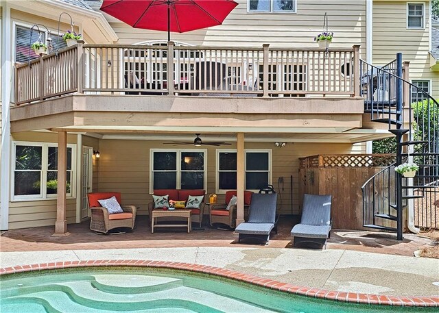 215 Settindown Ct, Roswell, GA 30075 - rear view of property with stairway, an outdoor hangout area, a patio area, and ceiling fan