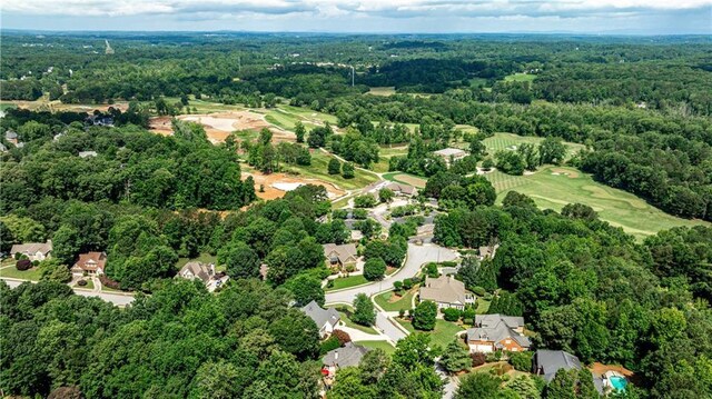 215 Settindown Ct, Roswell, GA 30075 - aerial view of property and surrounding area featuring a heavily wooded area and nearby suburban area
