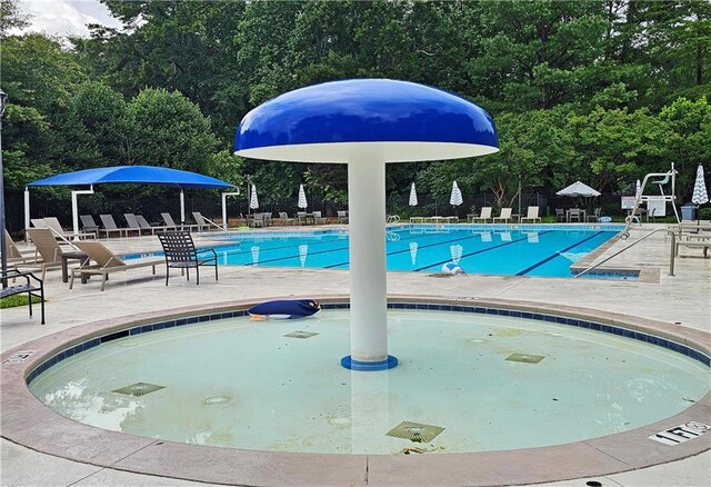 215 Settindown Ct, Roswell, GA 30075 - community pool featuring a patio