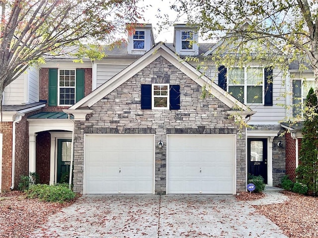 view of front of home with a garage