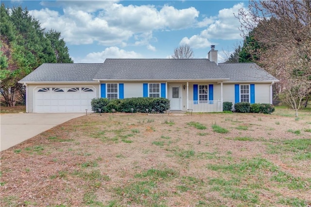 single story home featuring covered porch, driveway, a chimney, and an attached garage