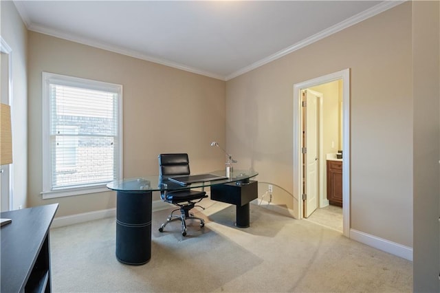 home office featuring crown molding, baseboards, and carpet floors