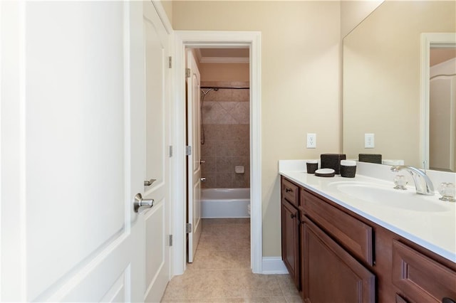 bathroom featuring tile patterned flooring and vanity