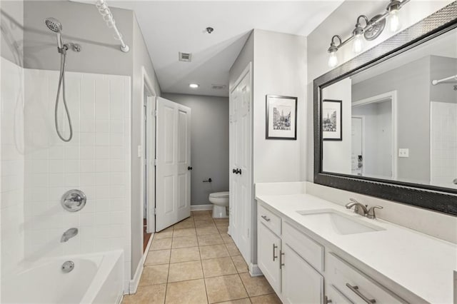 1101 Juniper St NE Unit 415, Atlanta, GA 30309 - bathroom featuring toilet, tile patterned floors, shower / bathtub combination, vanity, and baseboards