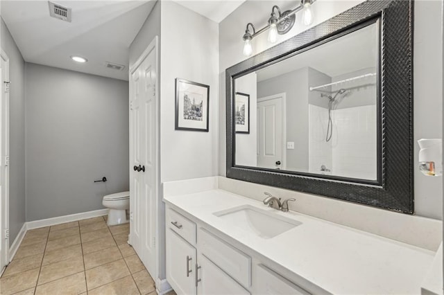 1101 Juniper St NE Unit 415, Atlanta, GA 30309 - full bath featuring toilet, tile patterned flooring, baseboards, vanity, and a shower