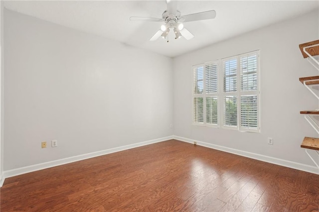 1101 Juniper St NE Unit 415, Atlanta, GA 30309 - unfurnished room with wood finished floors, baseboards, and ceiling fan