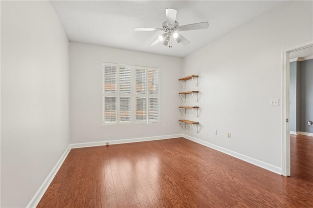 1101 Juniper St NE Unit 415, Atlanta, GA 30309 - empty room featuring wood finished floors, a ceiling fan, and baseboards