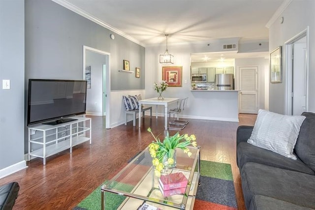 1101 Juniper St NE Unit 415, Atlanta, GA 30309 - living room featuring wood finished floors, ornamental molding, and baseboards