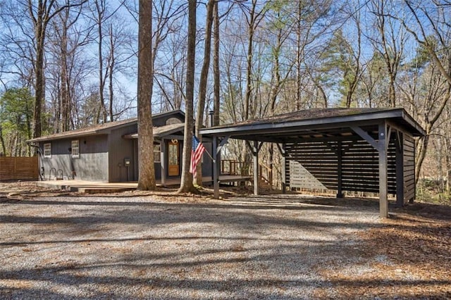 exterior space featuring gravel driveway