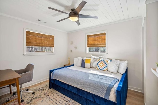 101 Evening Shade, Clayton, GA 30525 - bedroom with baseboards, ceiling fan, wood finished floors, and crown molding