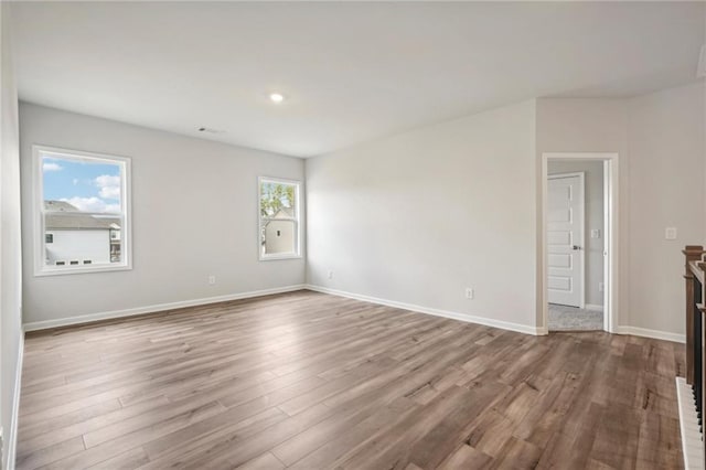 unfurnished room featuring light hardwood / wood-style flooring