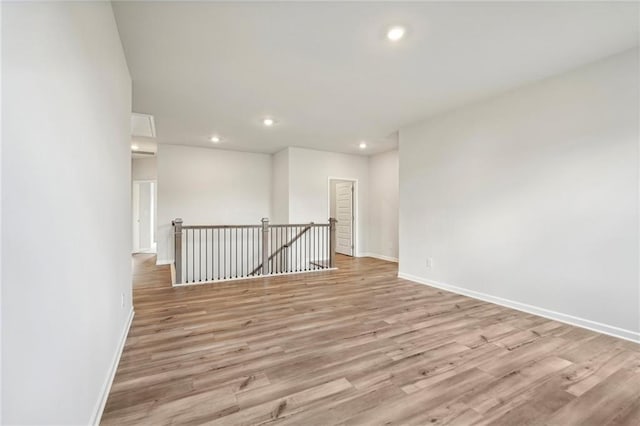 unfurnished room featuring light hardwood / wood-style flooring