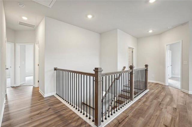 hallway featuring hardwood / wood-style flooring