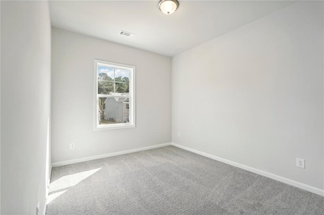 empty room featuring carpet floors