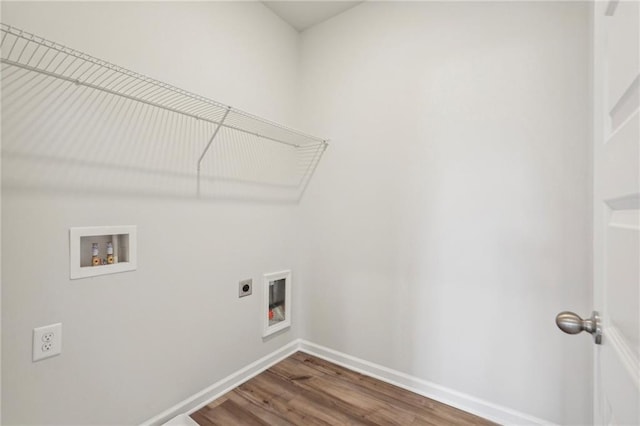 washroom with hardwood / wood-style flooring, washer hookup, and electric dryer hookup