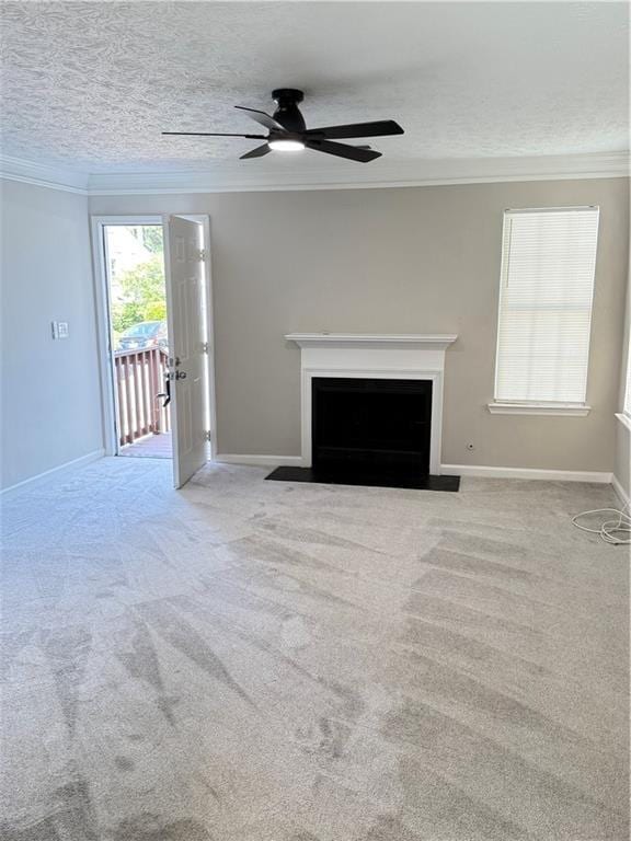 2115 Charter Ln, Lithonia, GA 30058 - unfurnished living room featuring carpet flooring, a fireplace with flush hearth, ceiling fan, baseboards, and ornamental molding