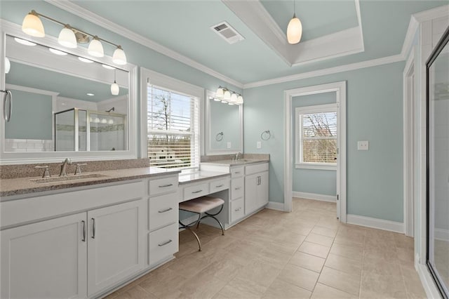 full bathroom with plenty of natural light, a shower stall, crown molding, vanity, and baseboards