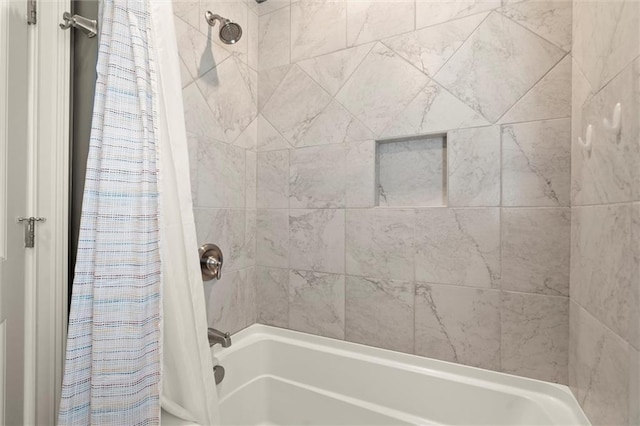 full bathroom with shower / tub combo