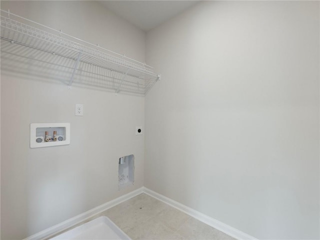 246 W Midland Ave, Winder, GA 30680 - laundry room featuring hookup for an electric dryer, hookup for a washing machine, and baseboards