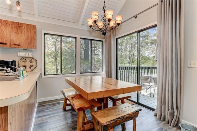 125 Wolfscratch Dr, Big Canoe, GA 30143 - dining area with dark wood-type flooring, a chandelier, plenty of natural light, and wood ceiling
