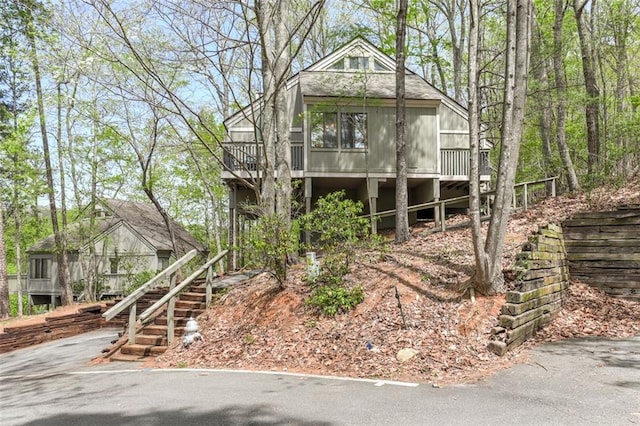 125 Wolfscratch Dr, Big Canoe, GA 30143 - rustic home with stairs