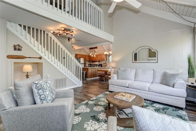 125 Wolfscratch Dr, Big Canoe, GA 30143 - living area featuring a chandelier, wood finished floors, high vaulted ceiling, stairway, and a ceiling fan
