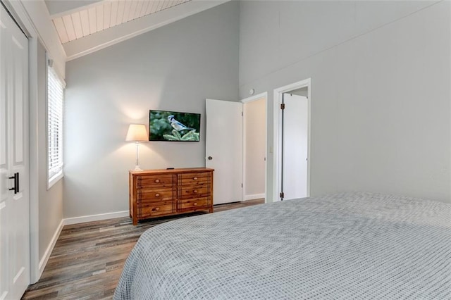 125 Wolfscratch Dr, Big Canoe, GA 30143 - bedroom with wood finished floors, multiple windows, beamed ceiling, high vaulted ceiling, and a closet
