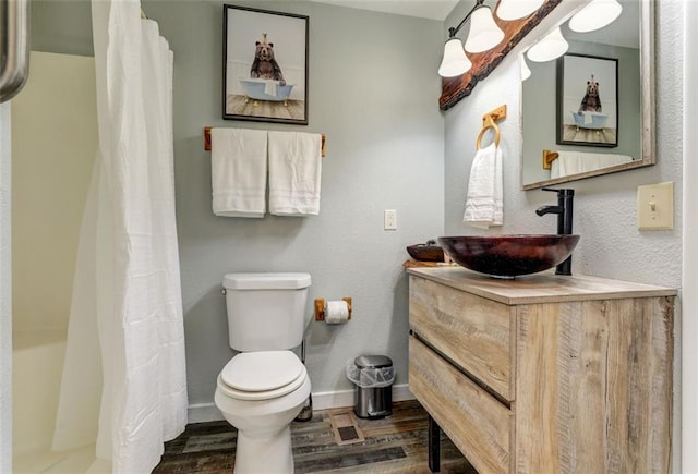 125 Wolfscratch Dr, Big Canoe, GA 30143 - full bathroom featuring wood finished floors, vanity, and a shower with shower curtain
