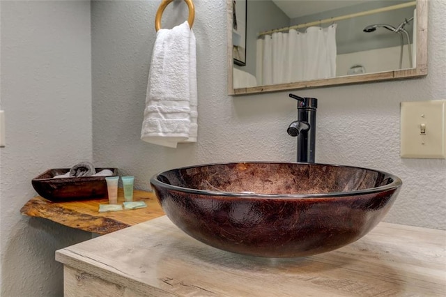 125 Wolfscratch Dr, Big Canoe, GA 30143 - bathroom view of a textured wall and a shower with shower curtain