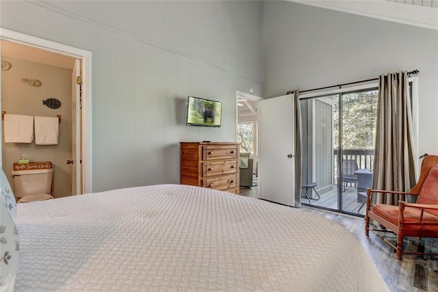 125 Wolfscratch Dr, Big Canoe, GA 30143 - bedroom with access to exterior, wood finished floors, and a towering ceiling