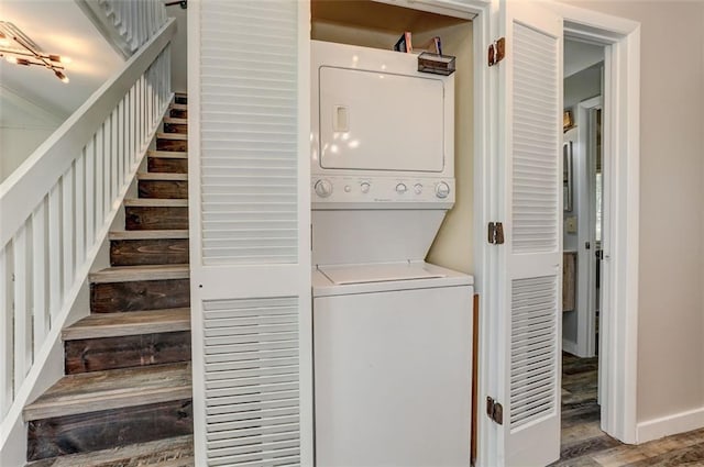 125 Wolfscratch Dr, Big Canoe, GA 30143 - laundry room featuring stacked washer / drying machine and wood finished floors