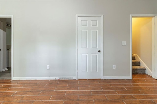 3821 Paul Samuel Rd NW, Kennesaw, GA 30152 - empty room with stairs, baseboards, and wood finish floors