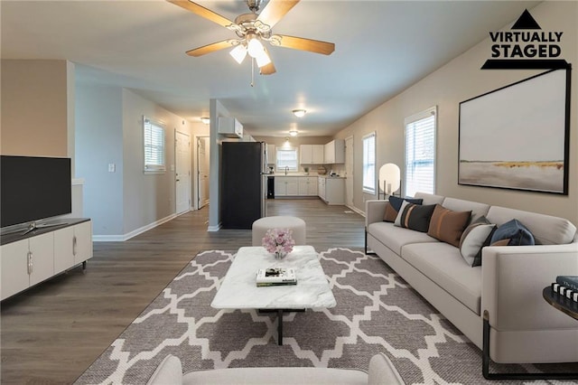 3821 Paul Samuel Rd NW, Kennesaw, GA 30152 - living room featuring ceiling fan, baseboards, and wood finished floors