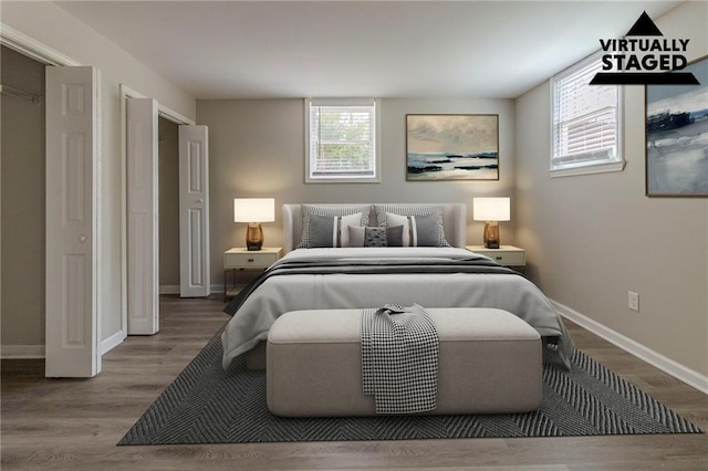 3821 Paul Samuel Rd NW, Kennesaw, GA 30152 - bedroom with baseboards and wood finished floors