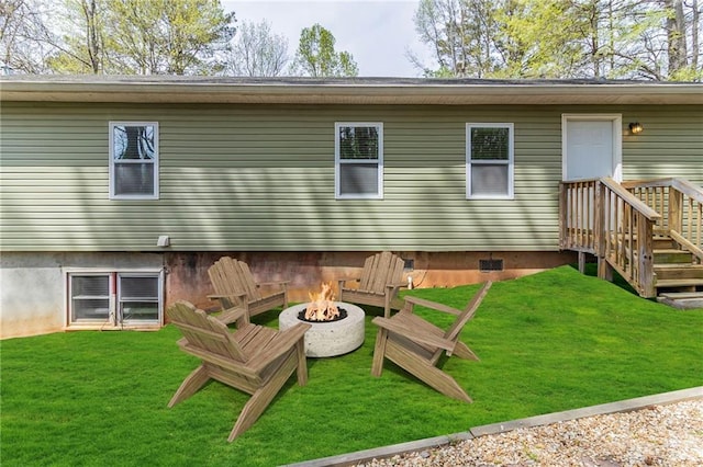 3821 Paul Samuel Rd NW, Kennesaw, GA 30152 - rear view of property with a yard and a fire pit