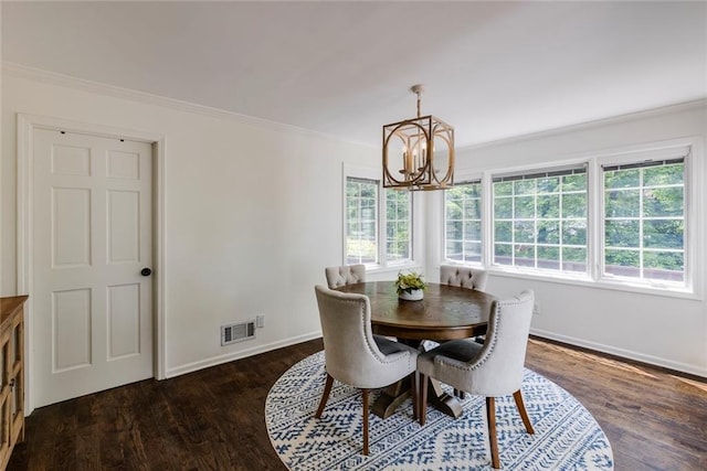 3707 Dunwoody Club Dr, Atlanta, GA 30350 - dining area with a chandelier, dark wood-type flooring, baseboards, and ornamental molding