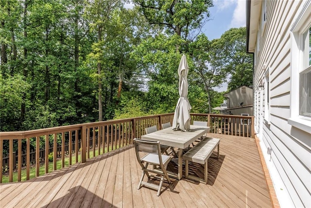 3707 Dunwoody Club Dr, Atlanta, GA 30350 - wooden deck featuring outdoor dining area and view of wooded area