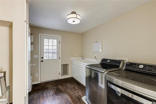 3707 Dunwoody Club Dr, Atlanta, GA 30350 - washroom featuring washing machine and dryer, a sink, dark wood-style floors, and baseboards