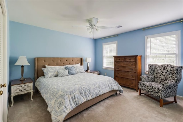 3707 Dunwoody Club Dr, Atlanta, GA 30350 - bedroom with carpet flooring, multiple windows, and ceiling fan