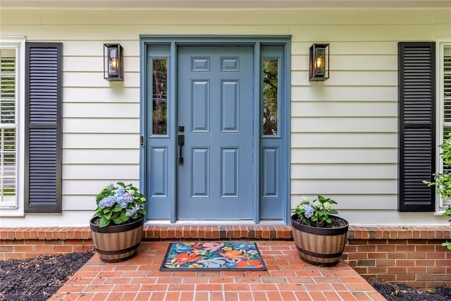 3707 Dunwoody Club Dr, Atlanta, GA 30350 - view of exterior entry with a porch