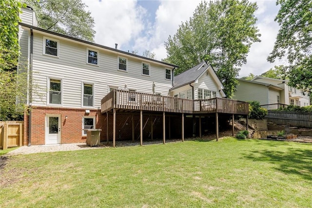 3707 Dunwoody Club Dr, Atlanta, GA 30350 - rear view of property with a deck, a chimney, and brick siding