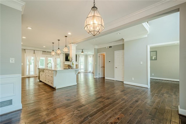 875 Soaring Cir, Marietta, GA 30062 - kitchen featuring open floor plan, white cabinets, dark wood-style flooring, a chandelier, and light countertops
